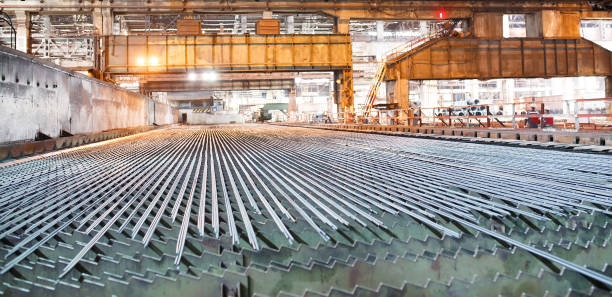 istock Metallurgy industry. Rolling mill. The valve is cooled after rolling. 1267568428