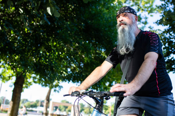 istock A cyclist with a long grey beard and a bandana 1267571871