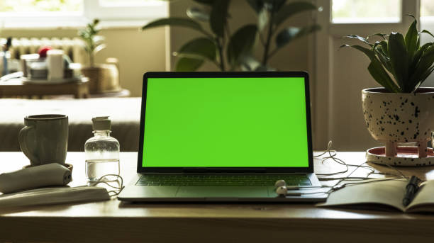 istock Self-isolation work from home. Medical mask on notebook laptop computer home working station. Protection mask anti virus corona ncov for safety quarantine 1267575779