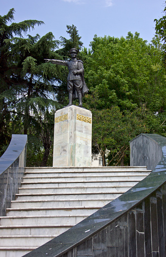 Kocaeli, Turkey - July 7, 2020: Ataturk monument built by architect Nijat SİRER in 1933 for 10. anniversary of repulic.  It was made by bronze and marble which is near kocaeli clock tower in kocaeli city turkey at summer.