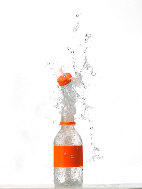 istock Water in glass bottle splashing 1267578400
