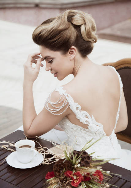 istock Portrait of beautiful bride drinking coffee. 1267579250