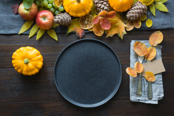 istock Fall table place setting decorated vegetables, pumpkins, aplles, harvest. Thanksgiving Day. 1267580508