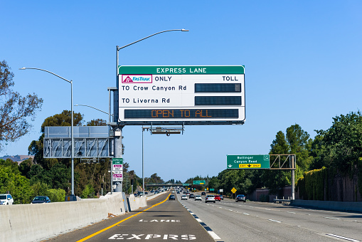 Aug 8, 2020 San Ramon / CA / USA - Designated express lane on a freeway in San Francisco Bay Area; Express lanes help manage lane capacity by allowing single occupancy vehicles to use them for a fee