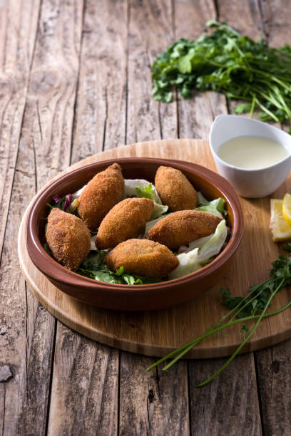 istock Traditional libanese kibbeh on wooden table 1267584611