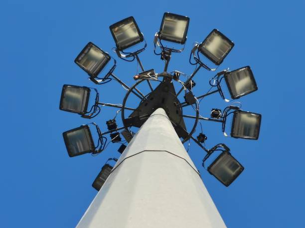 istock Street light on blue sky background 1267593024