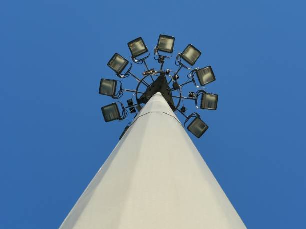 istock Street light on blue sky background 1267593026