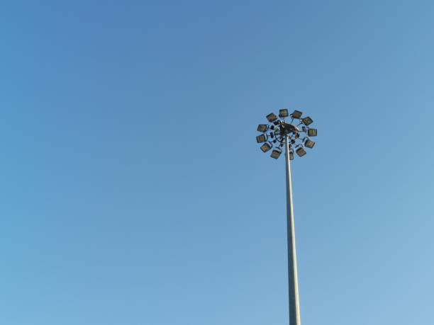 istock Street light on blue sky background 1267593036
