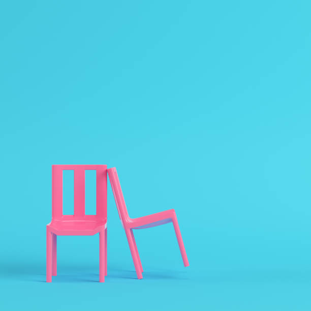 istock Two pink chairs on bright blue background in pastel colors 1267604858