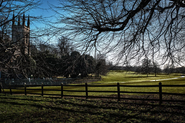 istock Church Covered By Trees, Fence Infront, Surrounded By Grass 1267605848
