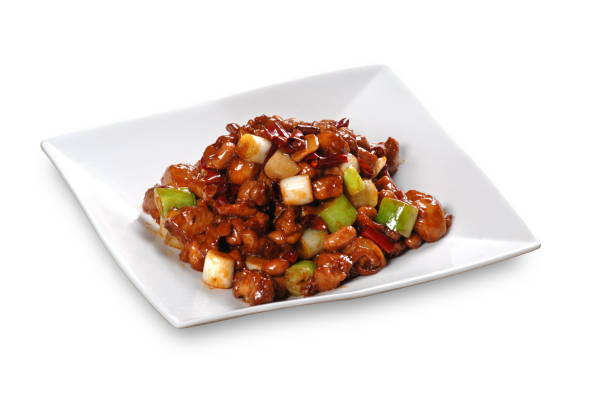 Close up of one of the most popular Chinese Sichuan province cuisine Kung Pao Chicken  (Chinese: Gongbaojiding) stock photo