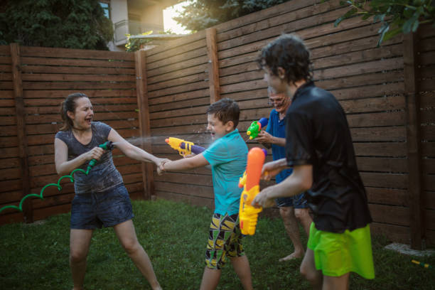 istock Summer water fight in our yard 1267613017