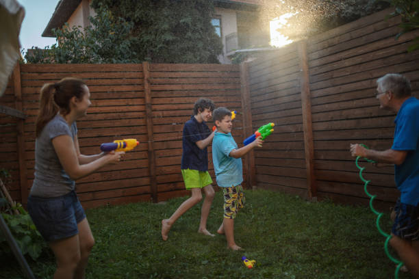 istock Summer water fight in our yard 1267613076