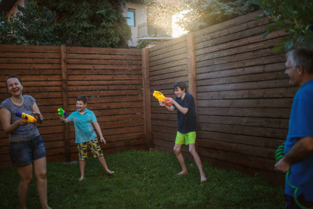 istock Water fight with my family 1267615023