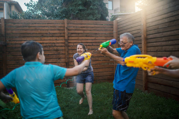 istock Water fight with my family 1267615037