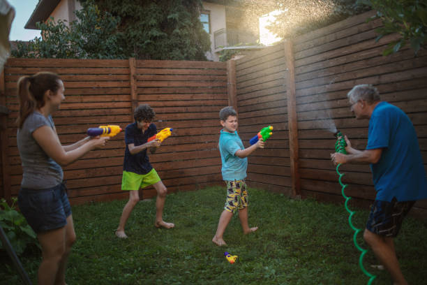 istock Water fight with my family 1267615082