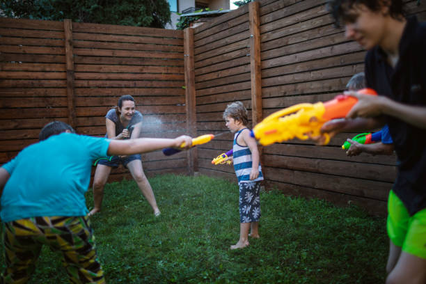 istock Water fight with my family 1267615103