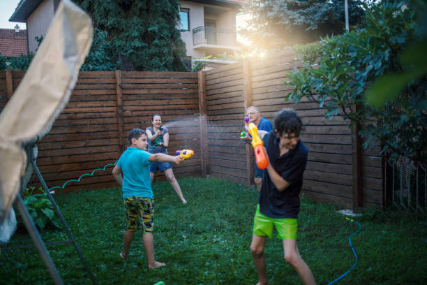 istock Water fight with my family 1267615690
