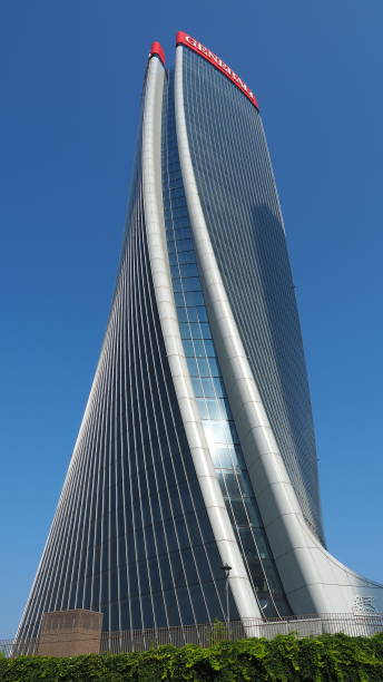 Milano, Italy. The iconic Generali tower at CityLife district designed by Zaha Hadid. Skyscraper which is part of a group of residential and business buildings. Modern buildings stock photo