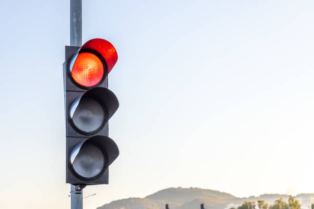 istock Candid photo of traffic light over a dramatic sky. Copy space for text. 1267625594