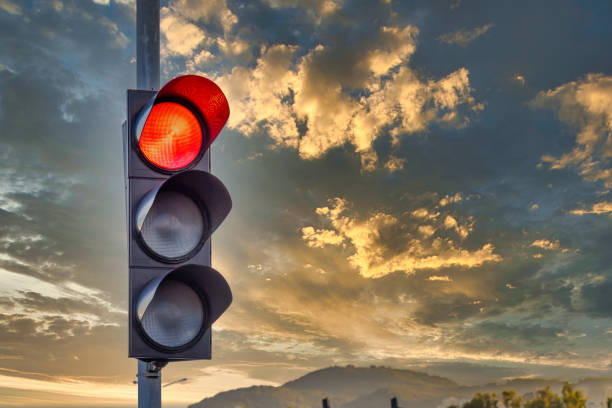 Candid photo of traffic light over a dramatic sky. Copy space for text.