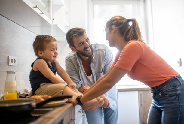 istock The family is making breakfast in their new kitchen, talking 1267636345