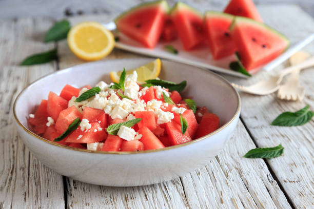 watermelon salad with feta cheese stock photo