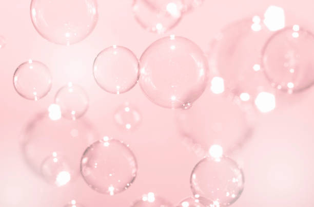 istock Beautiful shiny pink soap bubbles background. 1267648791