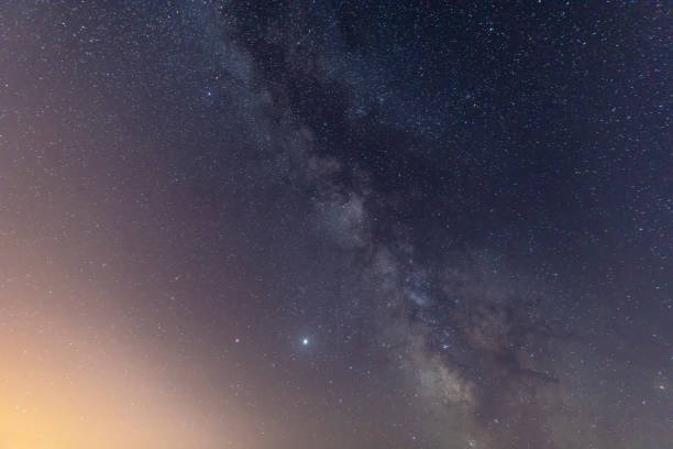 istock Milky way and falling meteorites in the night sky 1267650005