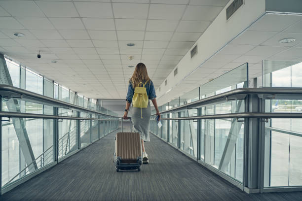 istock Silhouette of kind female going for boarding 1267652301