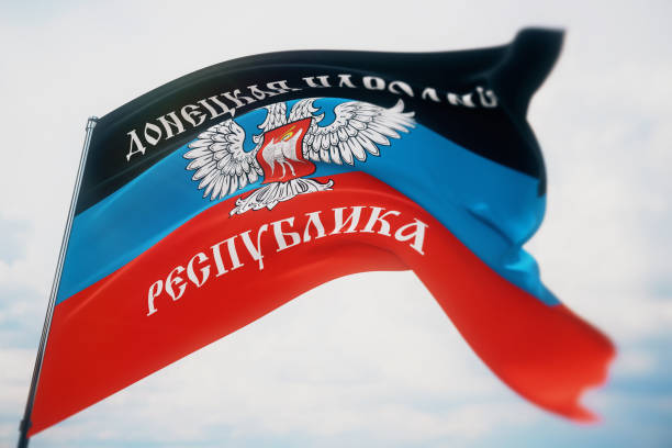 Waving flags of the world - flag of The Donetsk People's Republic, DPR or DNR. Shot with a shallow depth of field, selective focus. 3D illustration. Background with flag of Donetsk People's Republic donetsk photos stock pictures, royalty-free photos & images