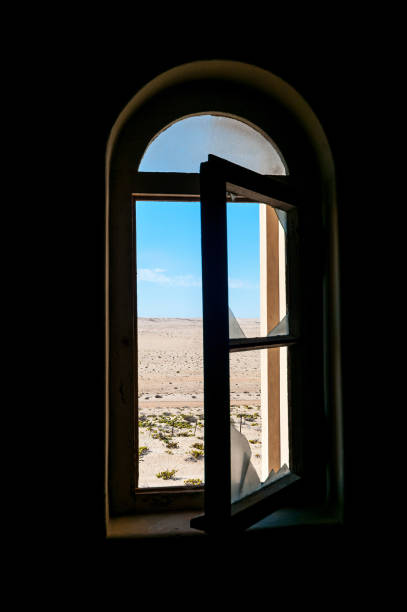 istock Decaying architecture at Kolmanskop, an abandoned diamond mining town 1267652842