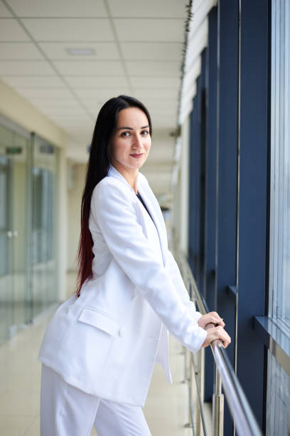 istock Businesswoman in office building 1267657012