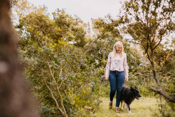 istock Young woman with her dog 1267657819