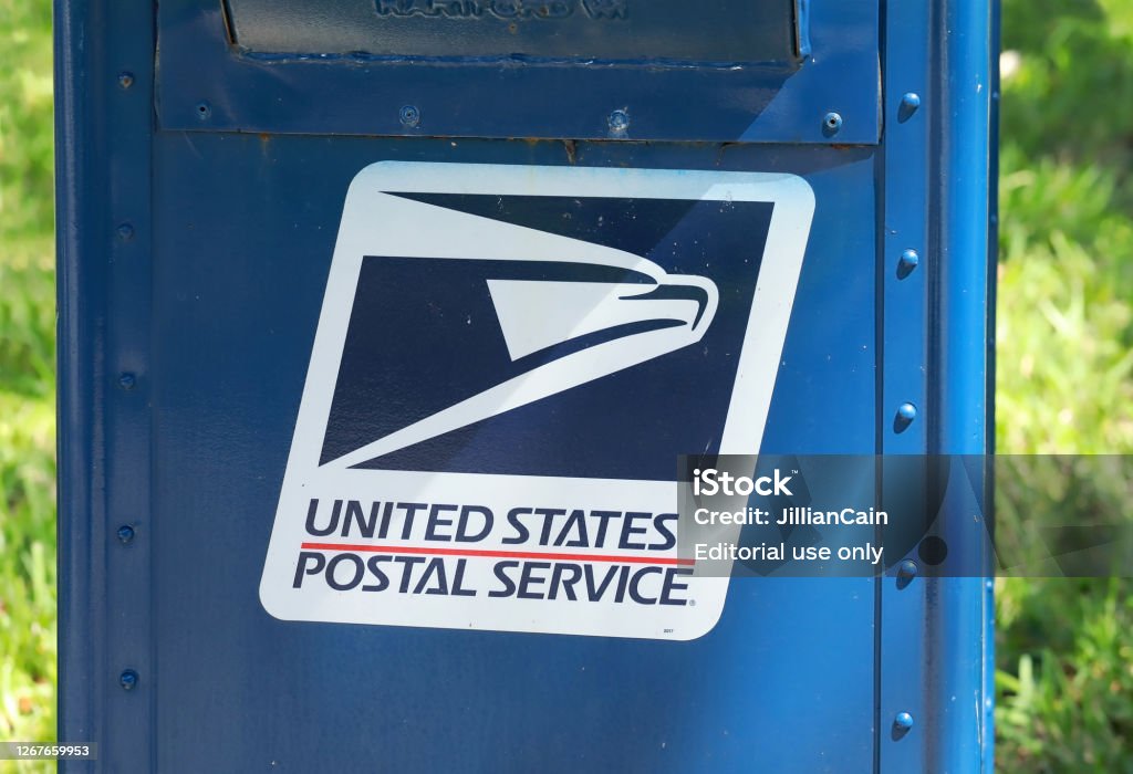 Mailbox - close up Fort Lauderdale, Florida, USA - August 18, 2020:  Close up of the United States Postal Service eagle logo on a neighborhood mailbox as seen on election day in Broward County. United States Postal Service Stock Photo