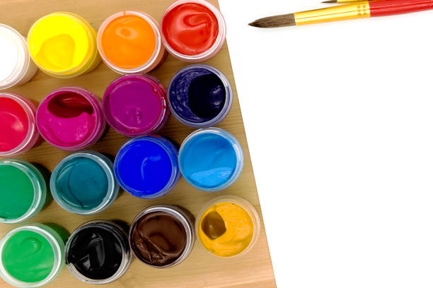 istock Gouache paints on a wooden table. 1267660857