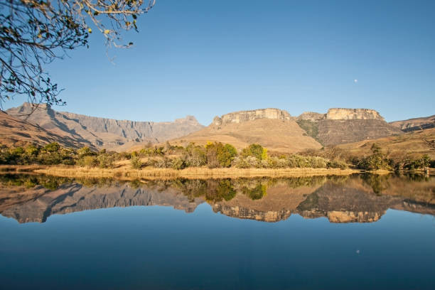 istock Scenic reflections in a Drakensberg lake 11065 1267662704