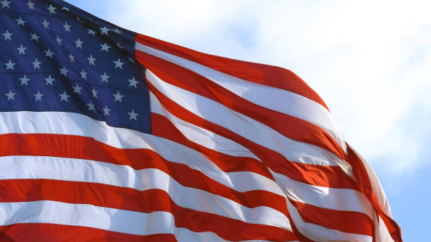 istock American flag waving proudly in the wind, close up 1267662811