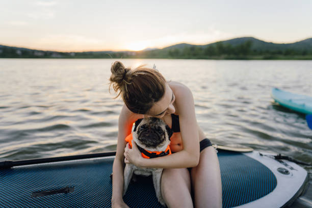 istock Best friends paddling on the lake 1267665267