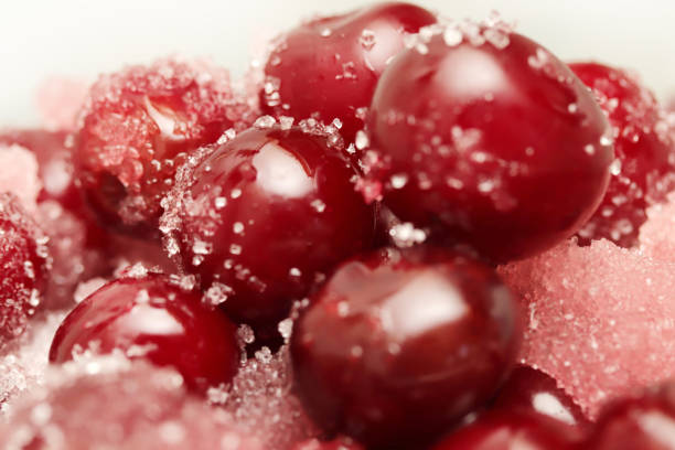Frozen cranberries with frosting isolated on white background