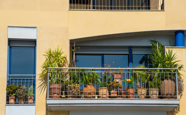 istock Balconies with flowers pot 1267666192
