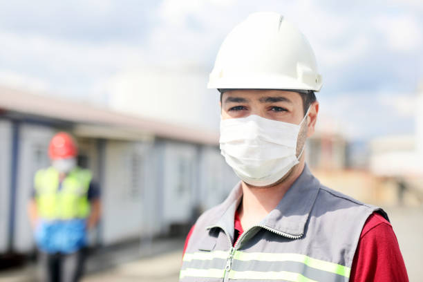 istock The worker is using a protective mask for coronavirus (covid-19) in the construction site. 1267667808