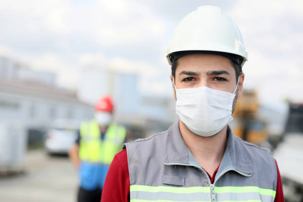 istock The worker is using a protective mask for coronavirus (covid-19) in the construction site. 1267667811