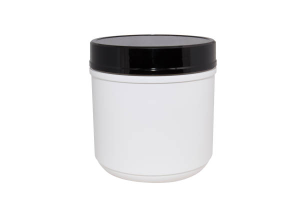 istock White plastic tube with black round cap isolated on white background 1267669141