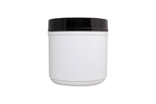 istock White plastic tube with black round cap isolated on white background 1267670547