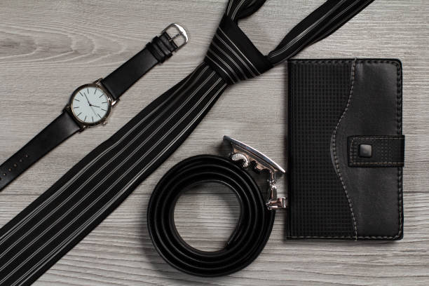 istock Accessories for men. Leather belt, watch, silk tie, notebook 1267672368