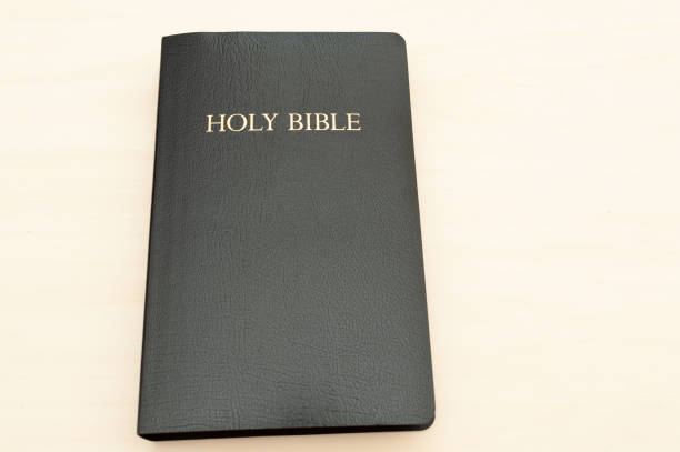istock Holy Bible isolated on beige background. Top view. Copy space 1267674626
