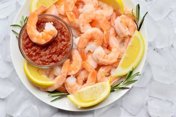Shrimps Shrimp cocktail appetizer plate stock pictures, royalty-free photos & images