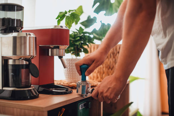 istock Man Making Coffee in a Modern Home 1267684254