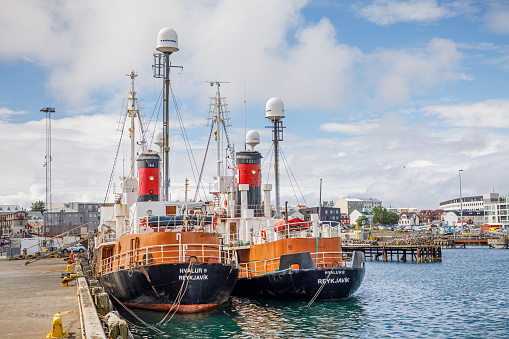 Reykjavik, Iceland, July 16, 2020: Whaling boats in harbor in Reykjavik, the capital of Iceland. The boats are still used as Iceland allows for a limited hunt on whales